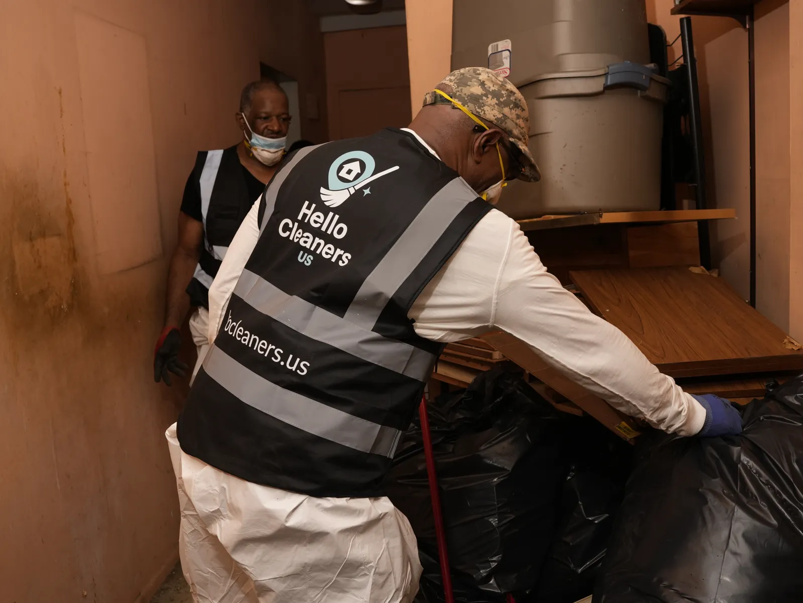 Hello Cleaners crew clearing a room