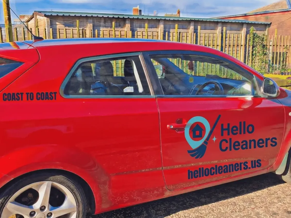 Hello Cleaners team with a branded van and professional cleaning equipment