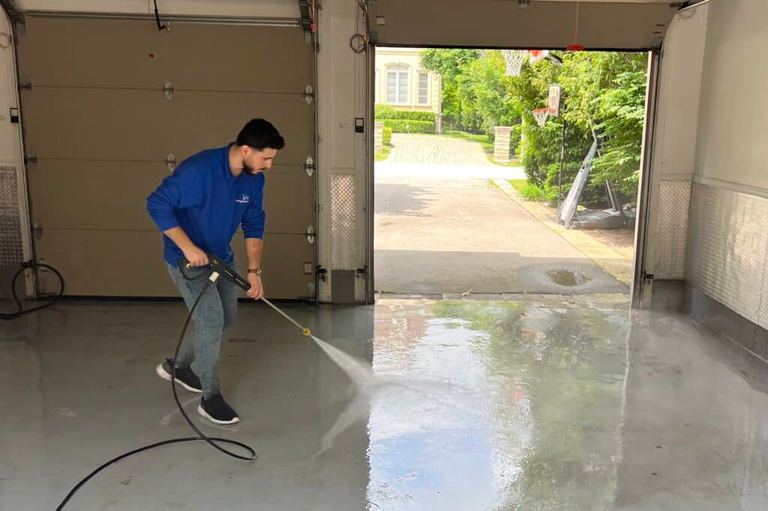 Pressure washing equipment in use
