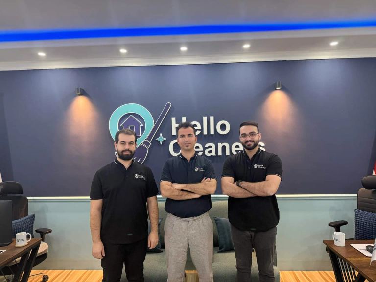 Three members of the Hello Cleaners team at the company office
